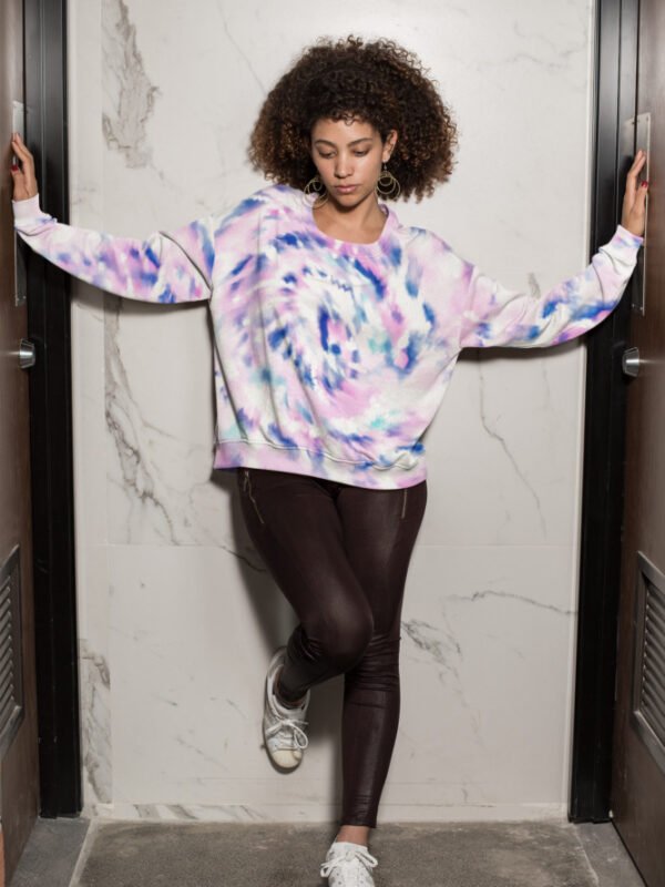 sublimated-sweatshirt-mockup-featuring-a-woman-standing-between-two-doors-31159